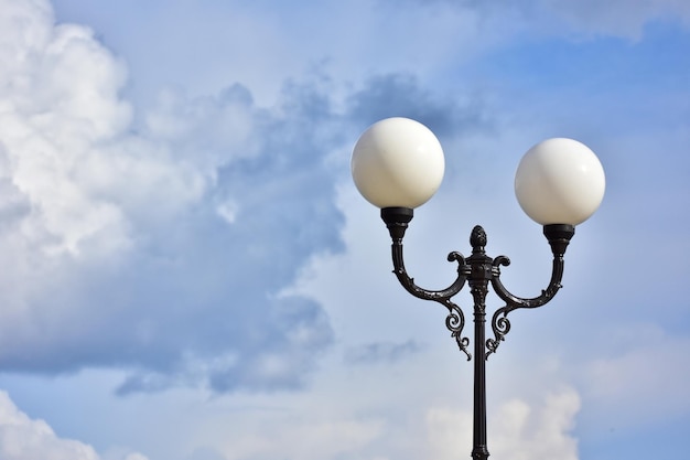 White lantern on cloudy sky background in malta