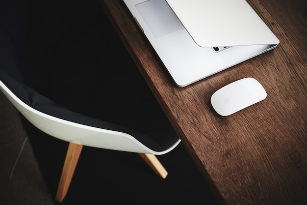 White laptop on the desk