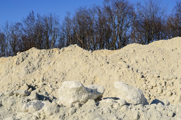 White limestone quarry and blue sky