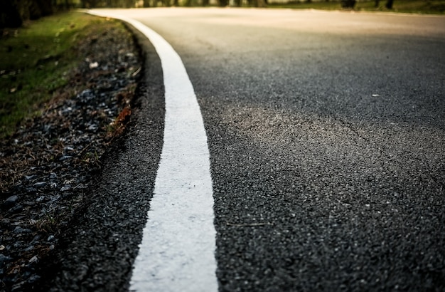 White line on the road.