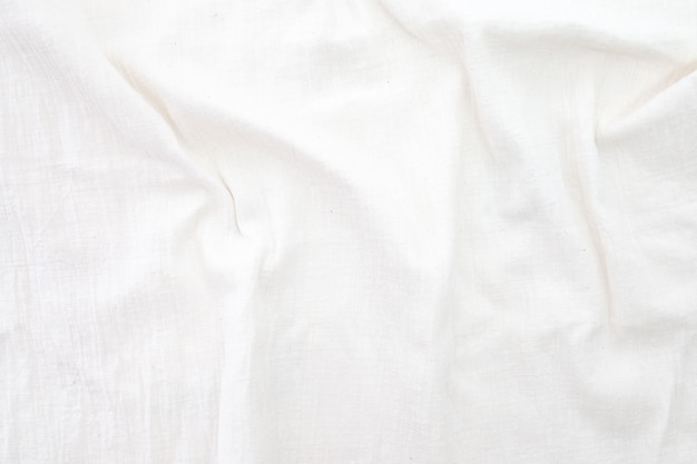 Photo white linen canvas crumpled natural cotton fabric natural handmade linen top view background