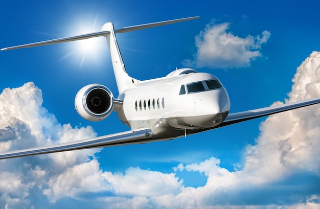 White luxury private jet flies in the air