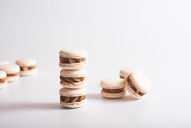 White macaron cookies Isolated on white background Tasty dessert