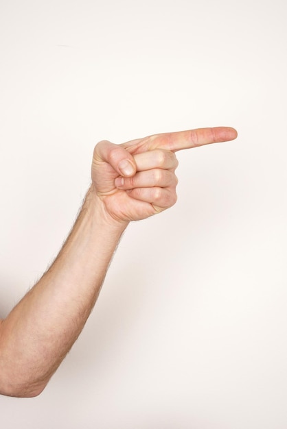 White male hand showing a right direction on a white isolated background.