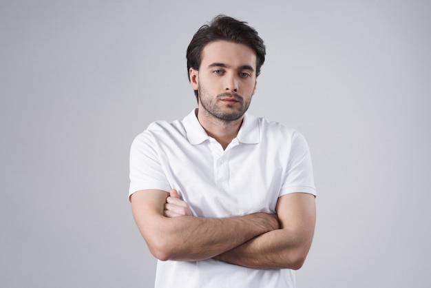 White man posing pensive isolated on white background.