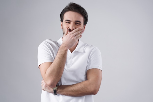 White man posing pensive isolated on white background.