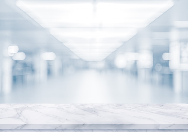 White marble surface on blurred empty office