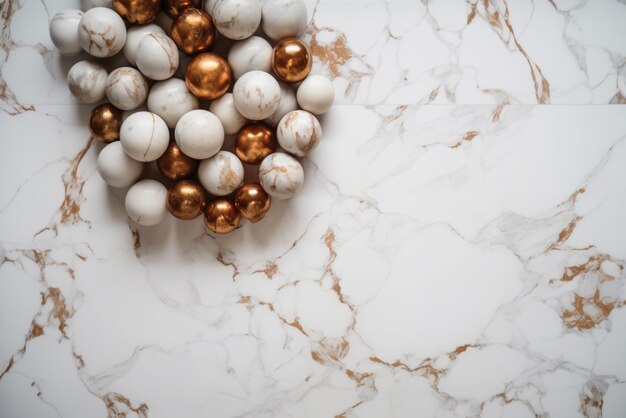 A white marble table with gold and white marble balls on it.