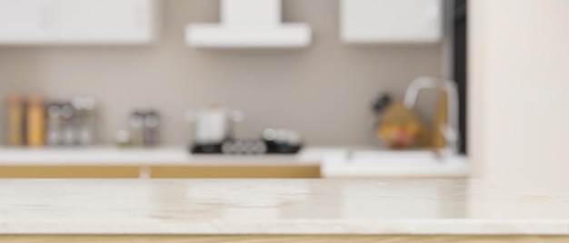 White marble tabletop with empty space over blurred modern home kitchen in the background