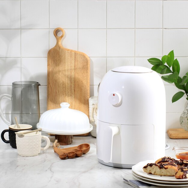 white mini air fryer for healthy cooking in the kitchen