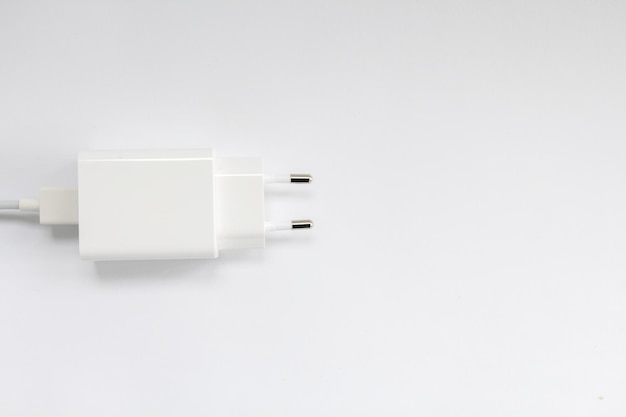 Photo white mobile charger on a white background