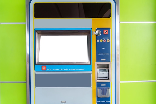 A white mockup of an automated ticket vending machine is showcased in a train or subway station