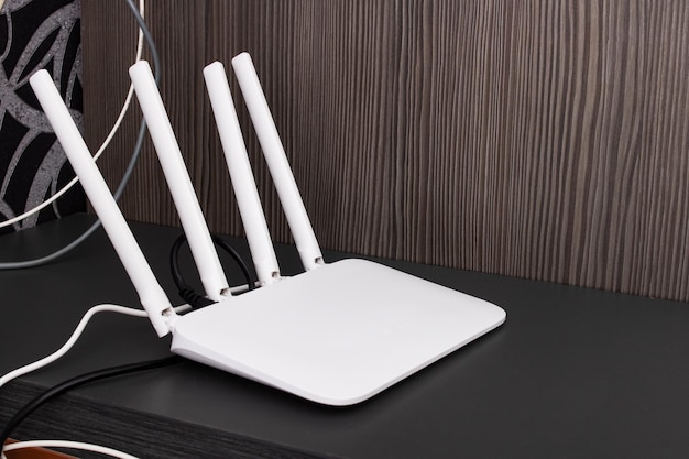 Photo white modem with antennas on the table