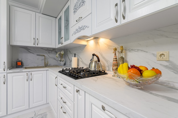 White modern kitchen in classic style