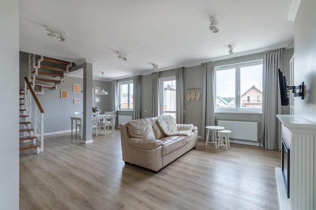 White modern open space with wooden furniture set