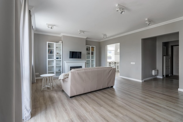 White modern open space with wooden furniture set