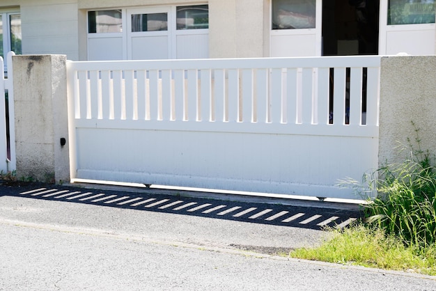 White modern street home door aluminum gate slats portal of suburb house