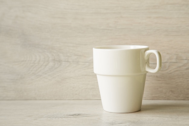 White mug mockup on home office table