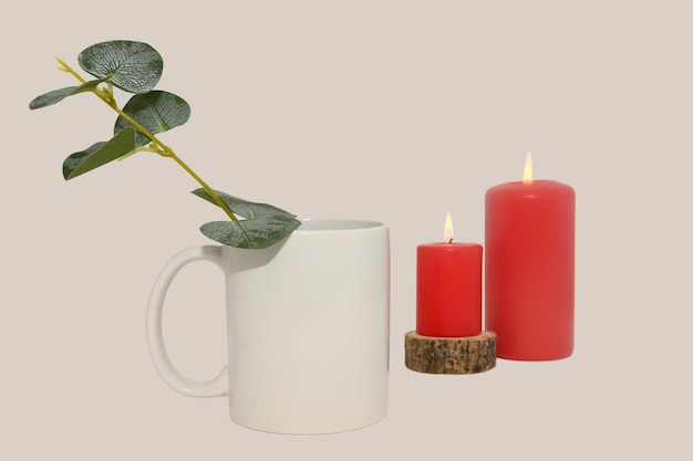 White mug mockup with candles and eucalyptus branch On a white background