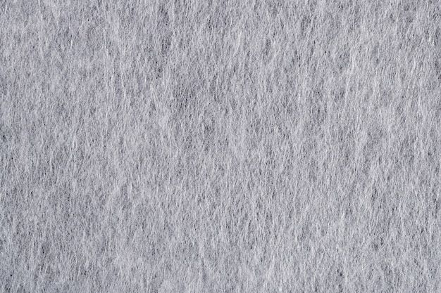 Foto fondo bianco di struttura del tessuto non tessuto