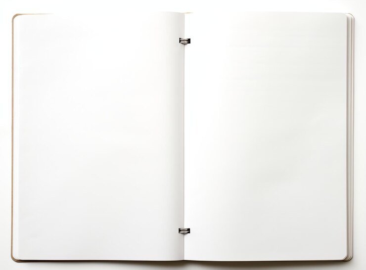 the white notebook on top of a white background stock photo