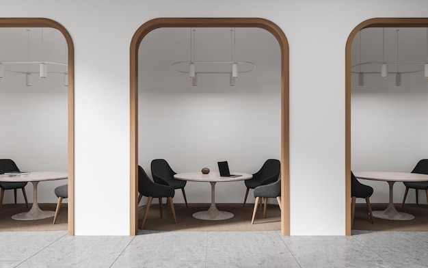 White office bank interior with work table and laptop consulting zone