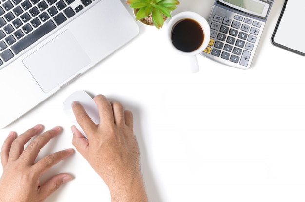 White office desk table with hand man using mouse with laptop isolated