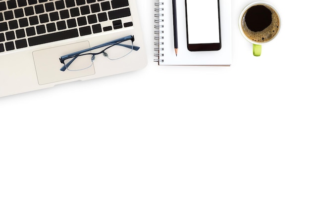 White office desk table with a lot of things on it