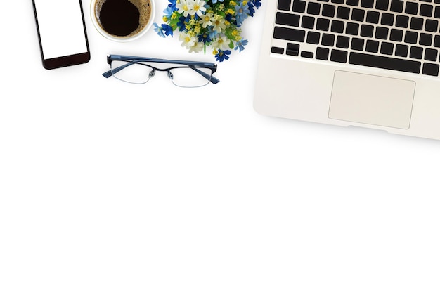 White office desk with laptop computer and helmet