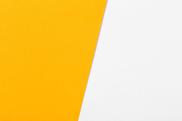 white and orange paper surface