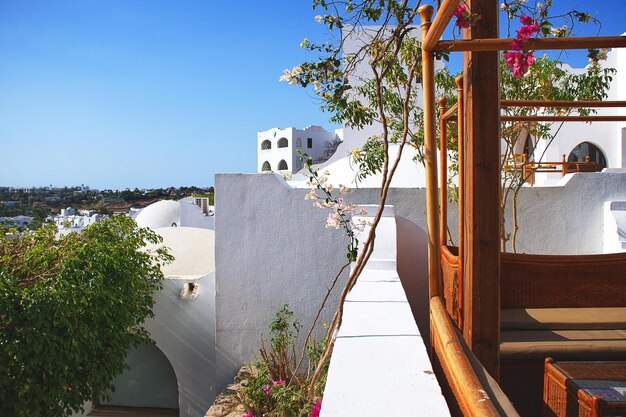 White oriental houses with domes on the sea background