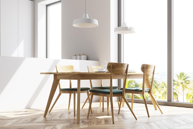 Белая панорамная столовая и кухонный уголок с деревянным полом и длинным деревянным столом со стульями рядом с ним. Современные потолочные светильники. 3d визуализация