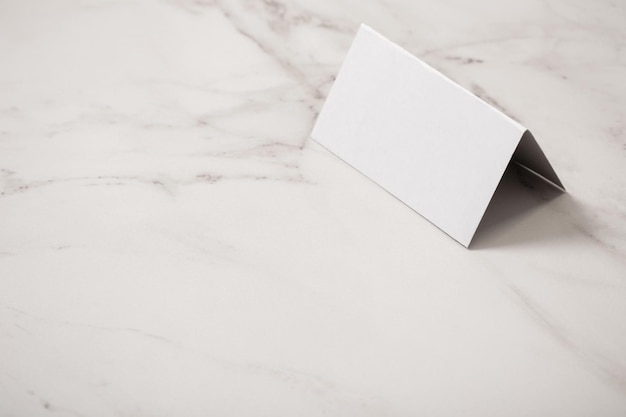 White paper blank on marble background
