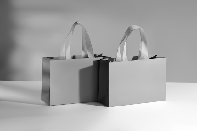 White paper matt shopping bag mockup with grey handles