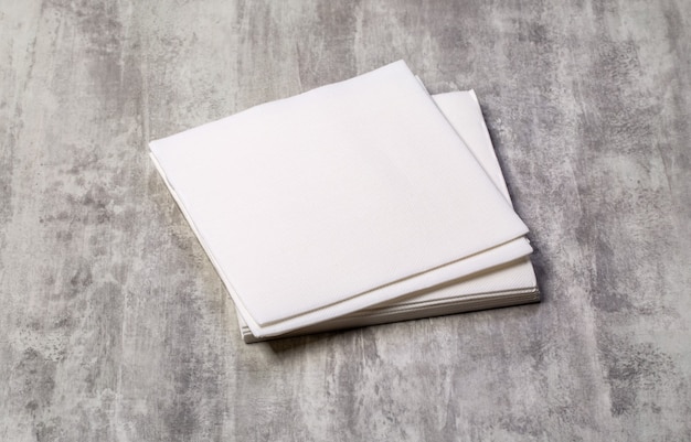 White paper napkin on old wooden table