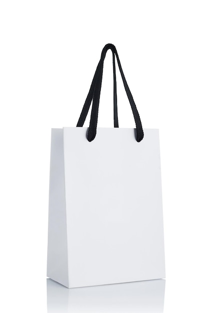 white paper shopping bag isolated on white background mockup for design sale concept