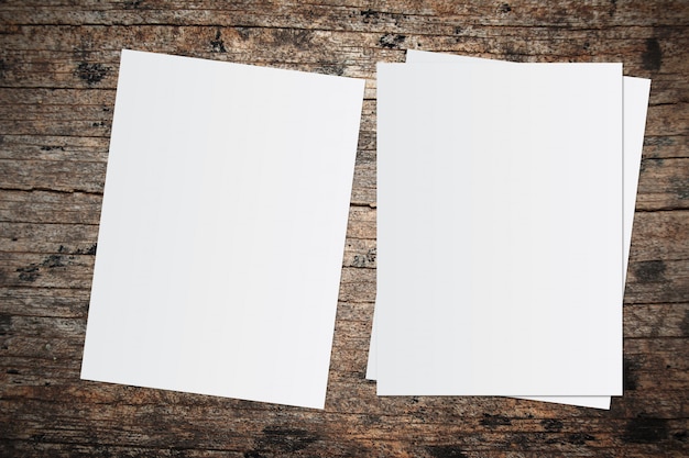 White paper and space for text on old wooden background