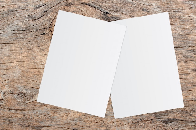 White paper and space for text on old wooden background