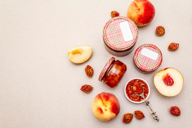 White peach jam, confiture, chutney in a glass jar