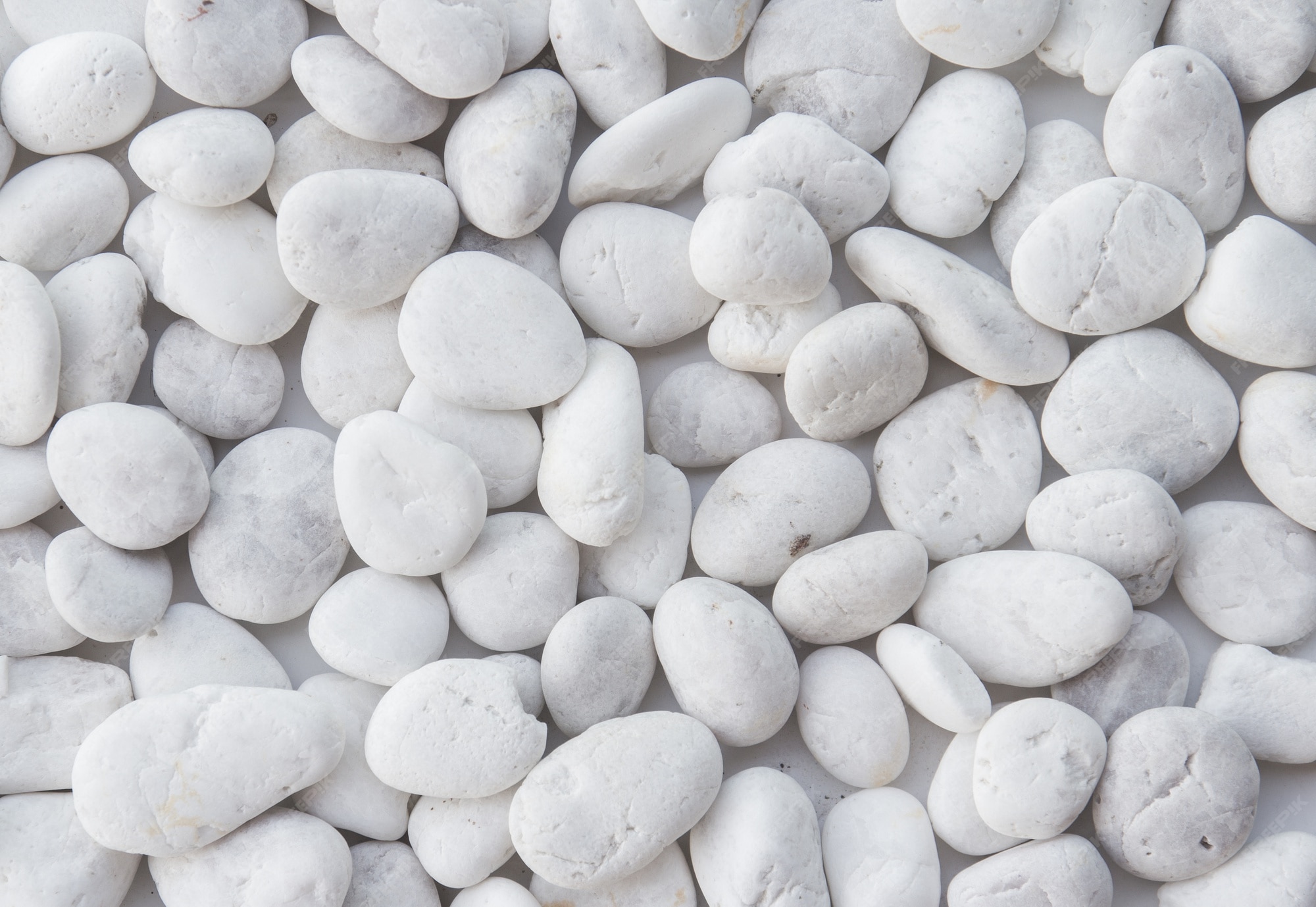 Premium Photo | White pebbles stone texture and background