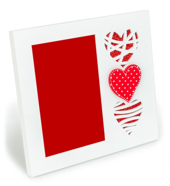 White photo frame with red hearts