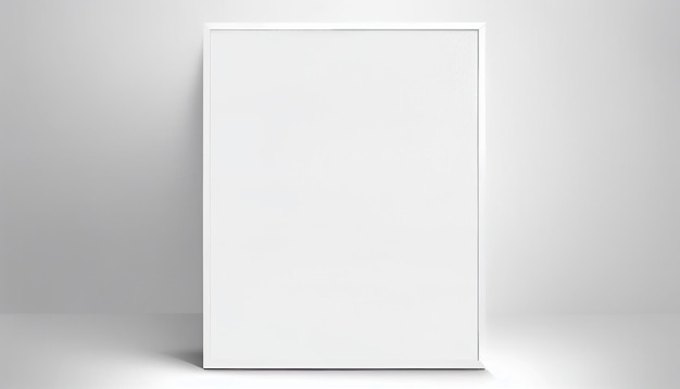 A white picture frame is against a white wall.