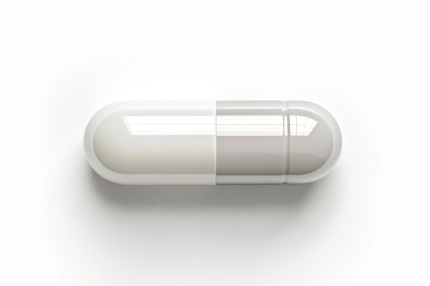 белая капсула таблетки, выделенная на белом фоне