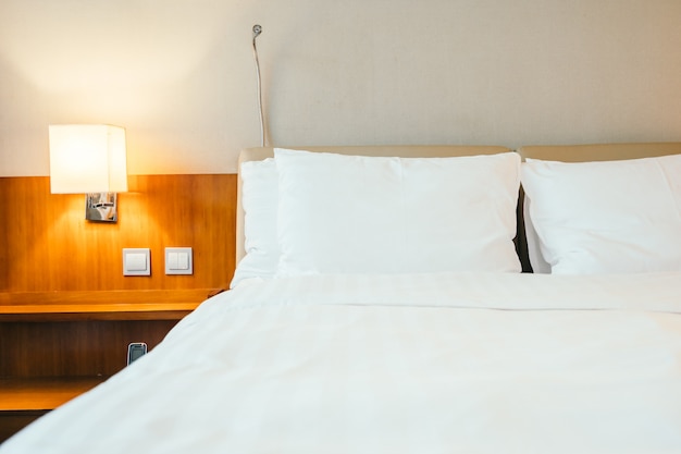 White pillow on bed decoration in bedroom interior