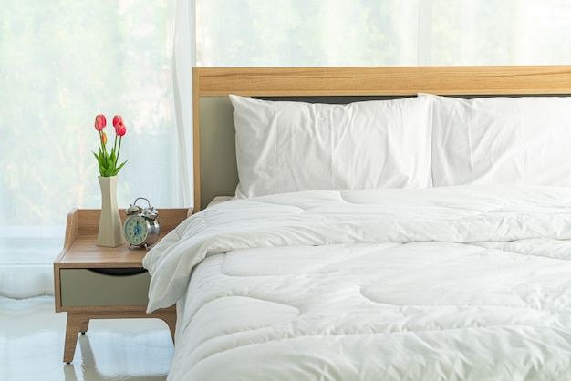 white pillow on bed decoration in bedroom