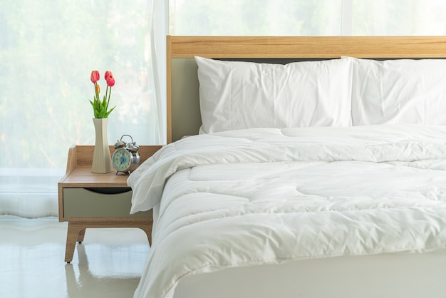 white pillow on bed decoration in bedroom