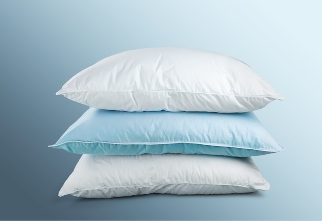 White Pillows Pile on grey background