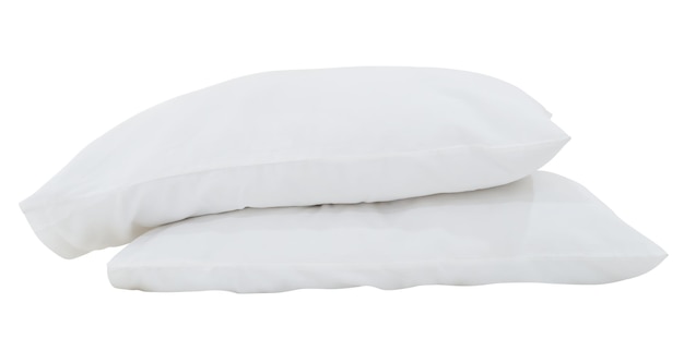 White pillows in stack with case after guests use in hotel or resort room isolated on white