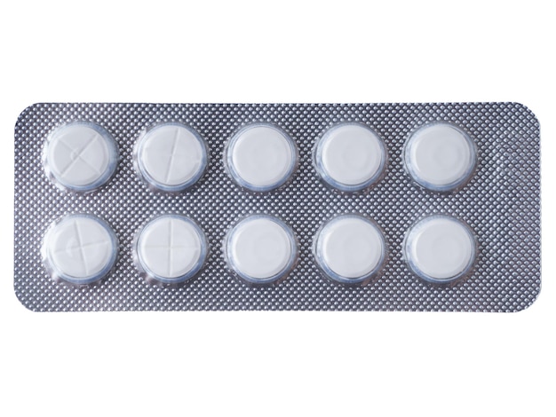 White pills in a grey blister pack Closeup