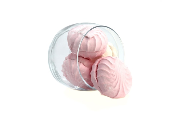 Marshmallow bianchi e rosa in un barattolo di vetro